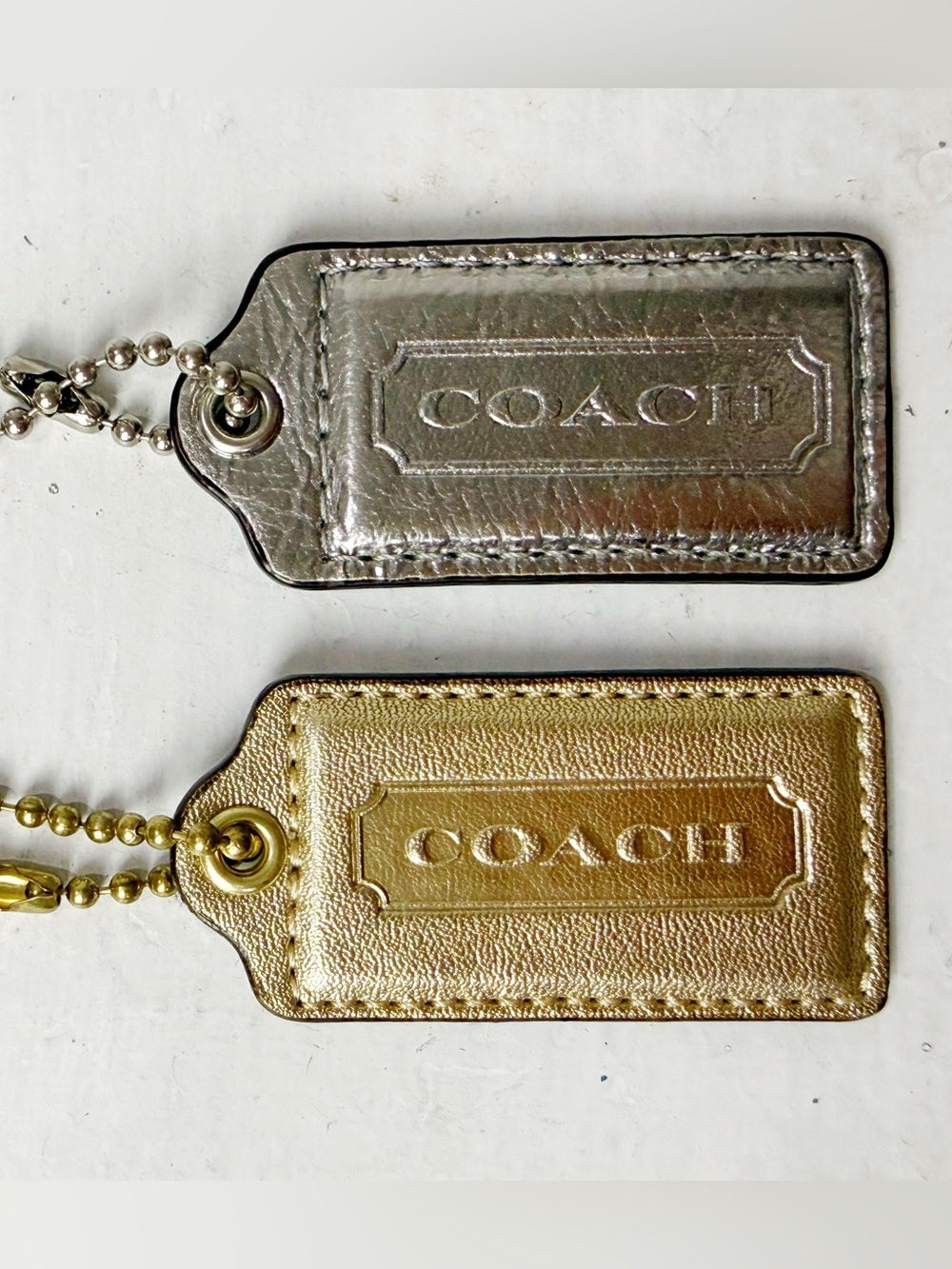 Coach Metallic Silver + Gold Leather Handtags with Embossed Logo 2.5”